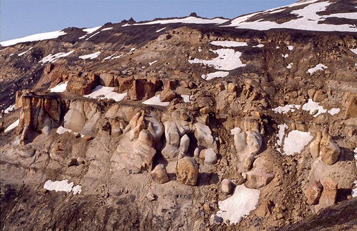 Fig. 92 Photograph of the thick-bedded Hennigryggen Member. The sandstone-dominated succession (up to the dark ledges) corresponds to the lowest c. 70 m of the succession shown in Fig. 90. Western side of the Hartz Fjeld mountain, Milne Land (Figs 1, 2b).