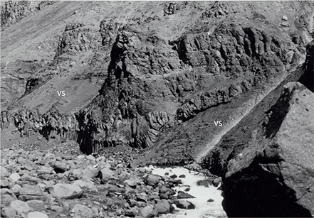 Fig. 50 Irregular, columnar-jointed lava sheets invading volcanogenic sediments (vs). Lower part of the Tunuarsuk Member, base of profile 38, Qaqqap Qaa, at 190 to c. 220 m altitude (Fig. 10).