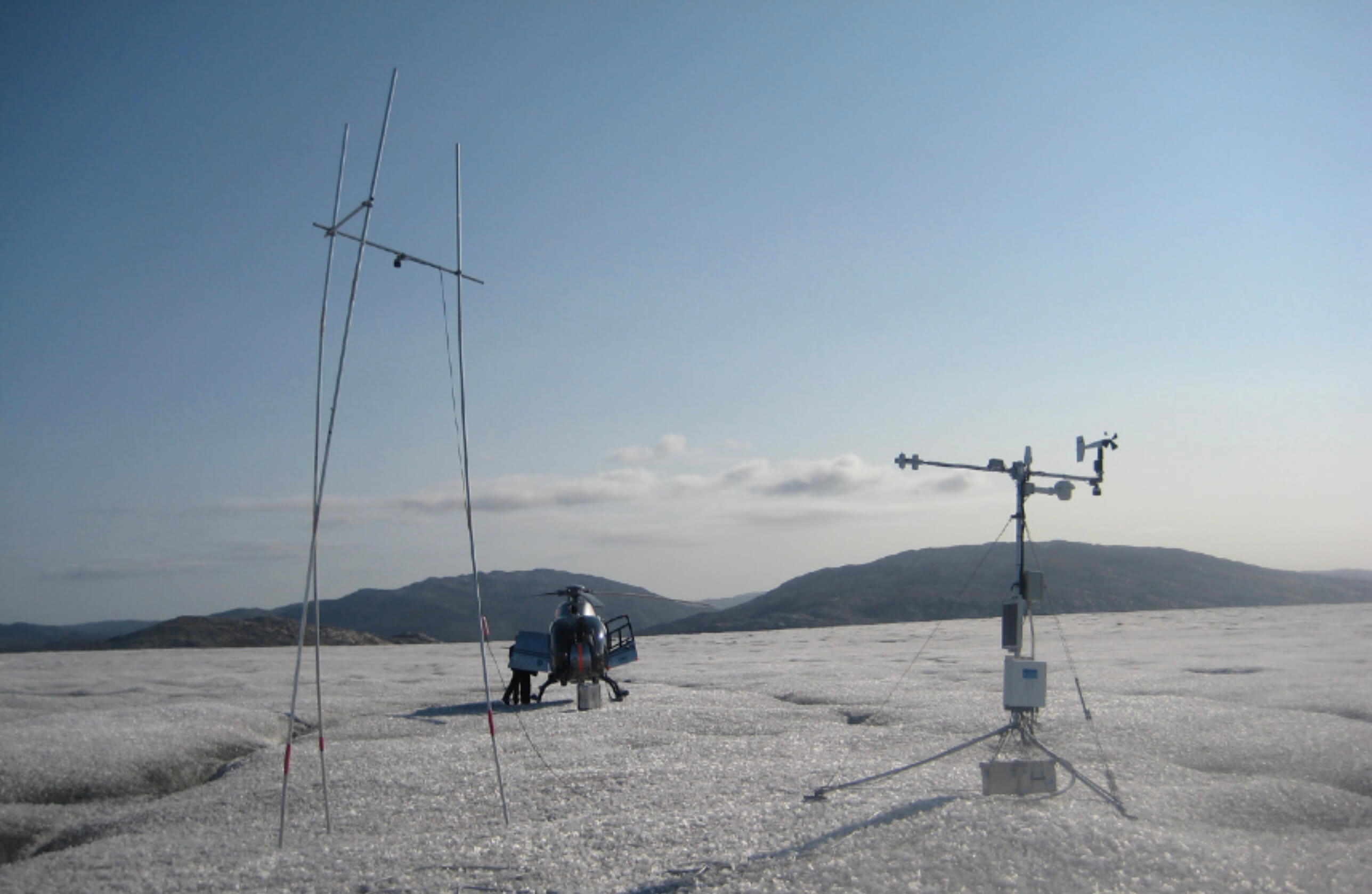 Weather stations sitting on the Greenland ice sheet