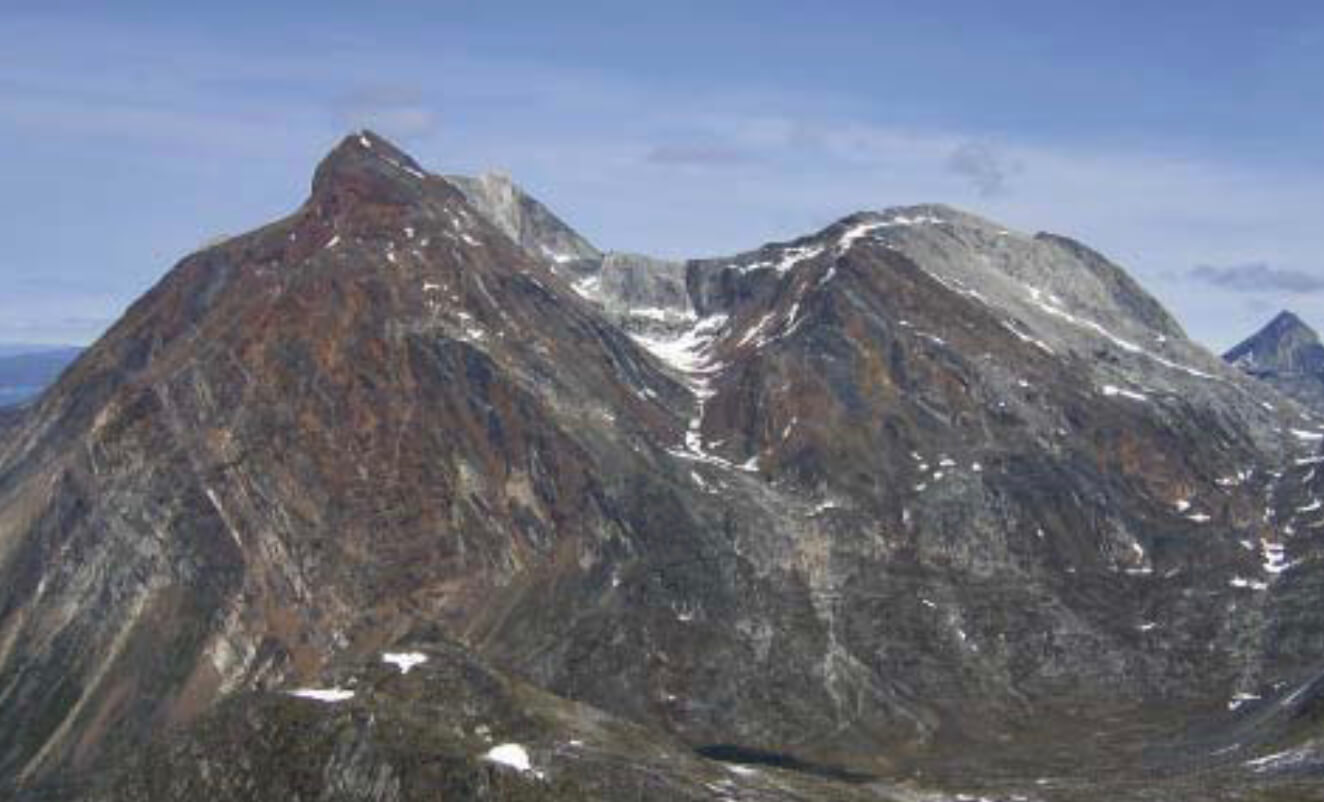 Mountains with snow and blue sky.