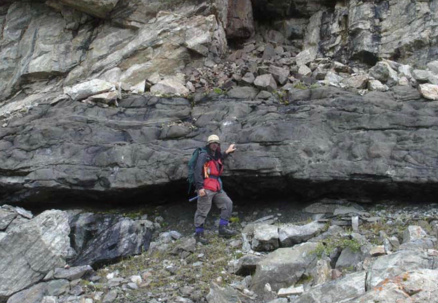 Band of rock with a person for scale.