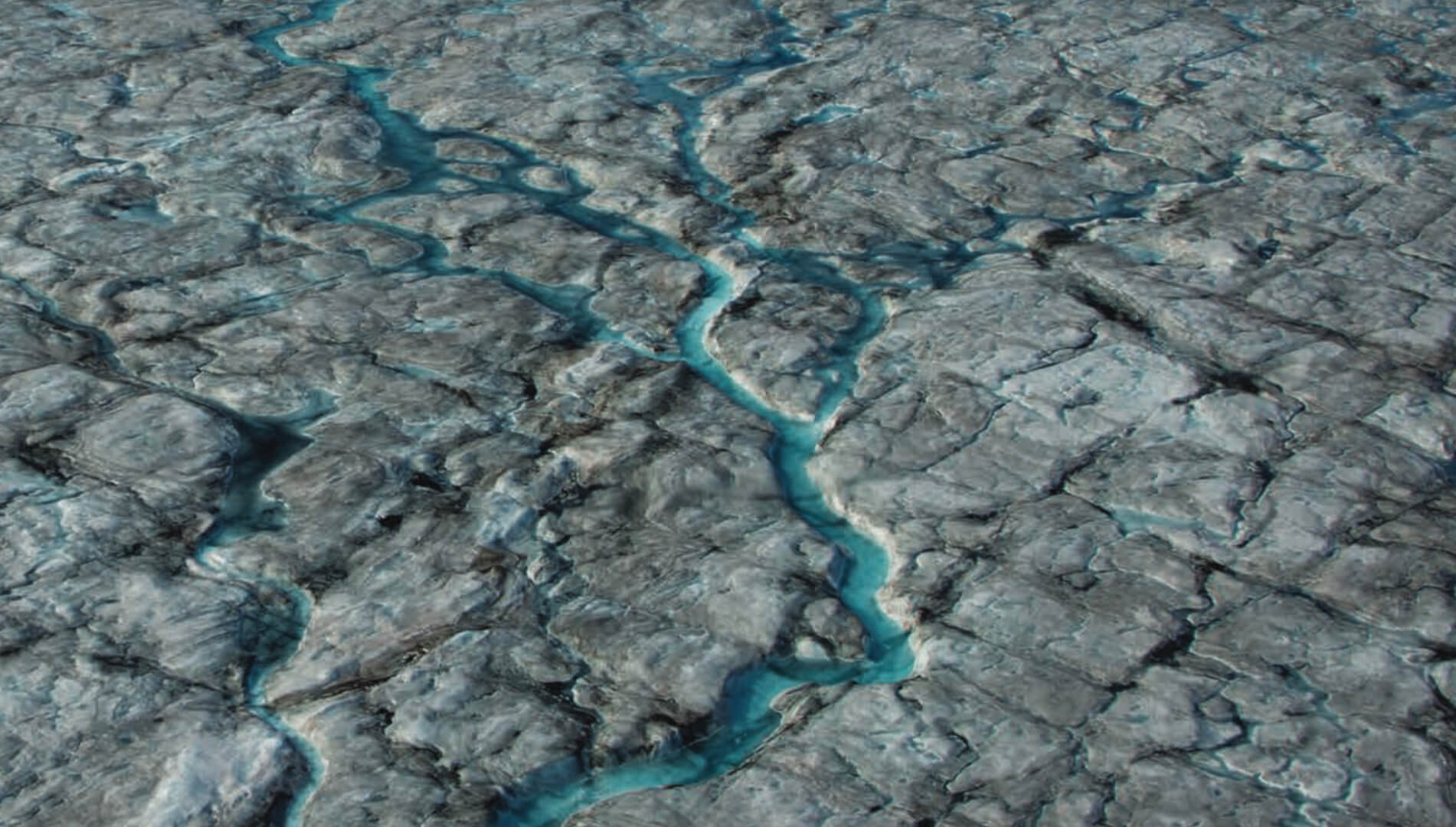 Melt water flows through dark ice sheet